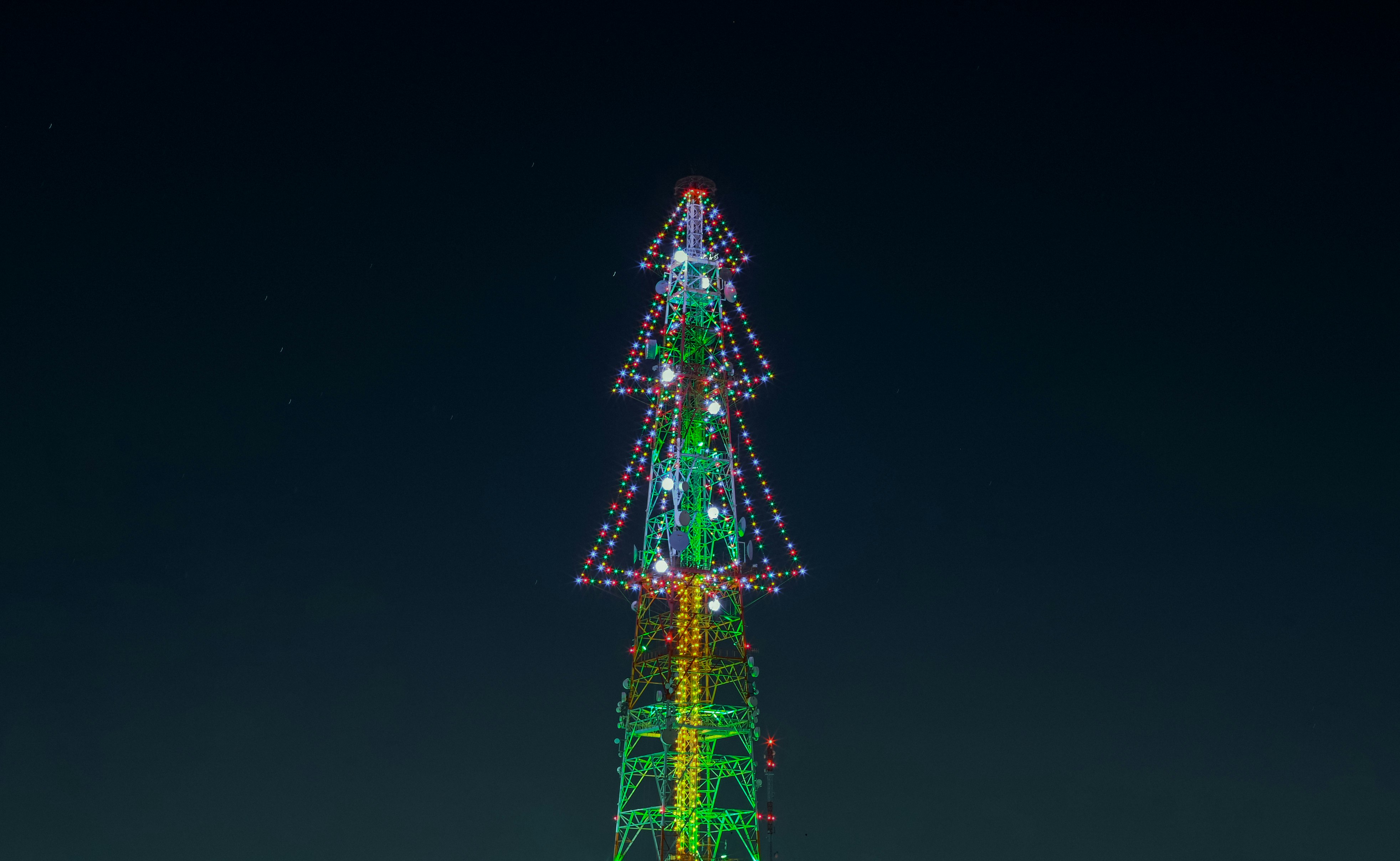 green and pink lighted tower